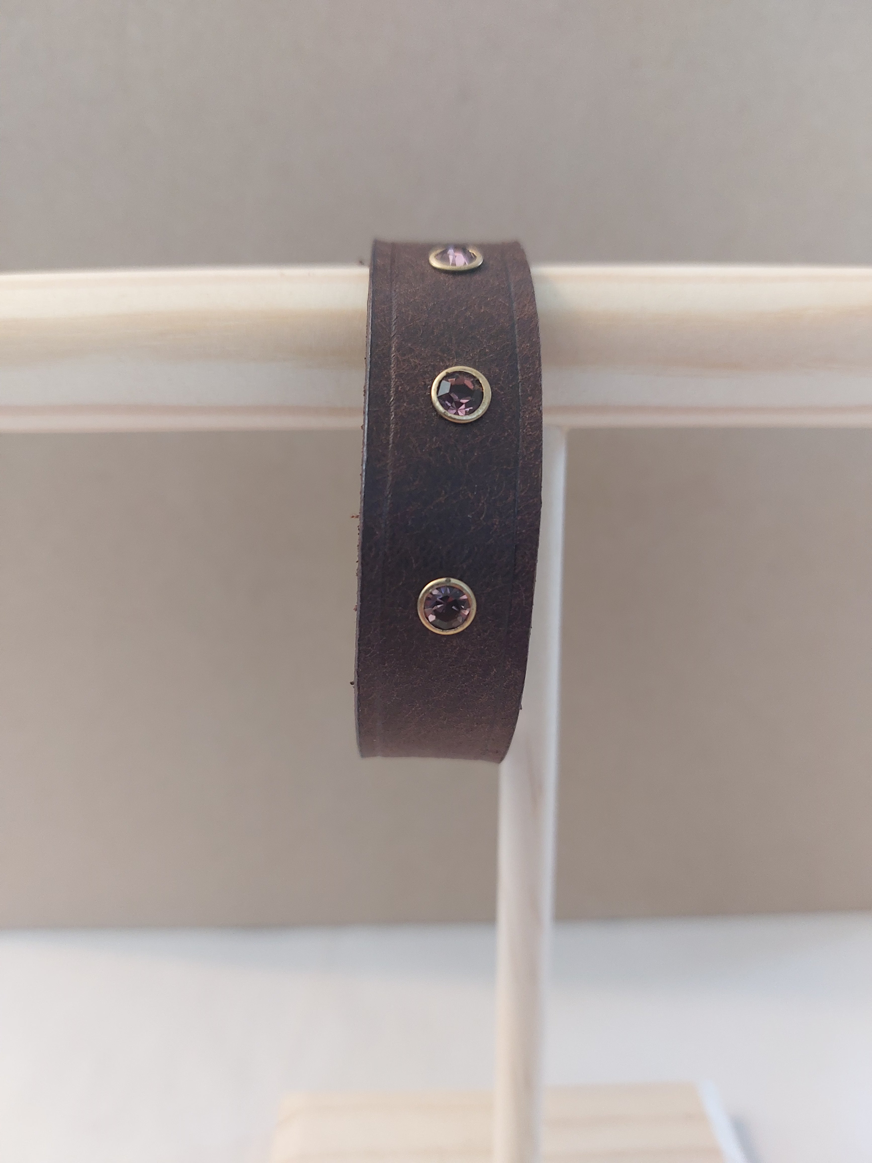 Amber Studded Bracelet made with dark brown leather.