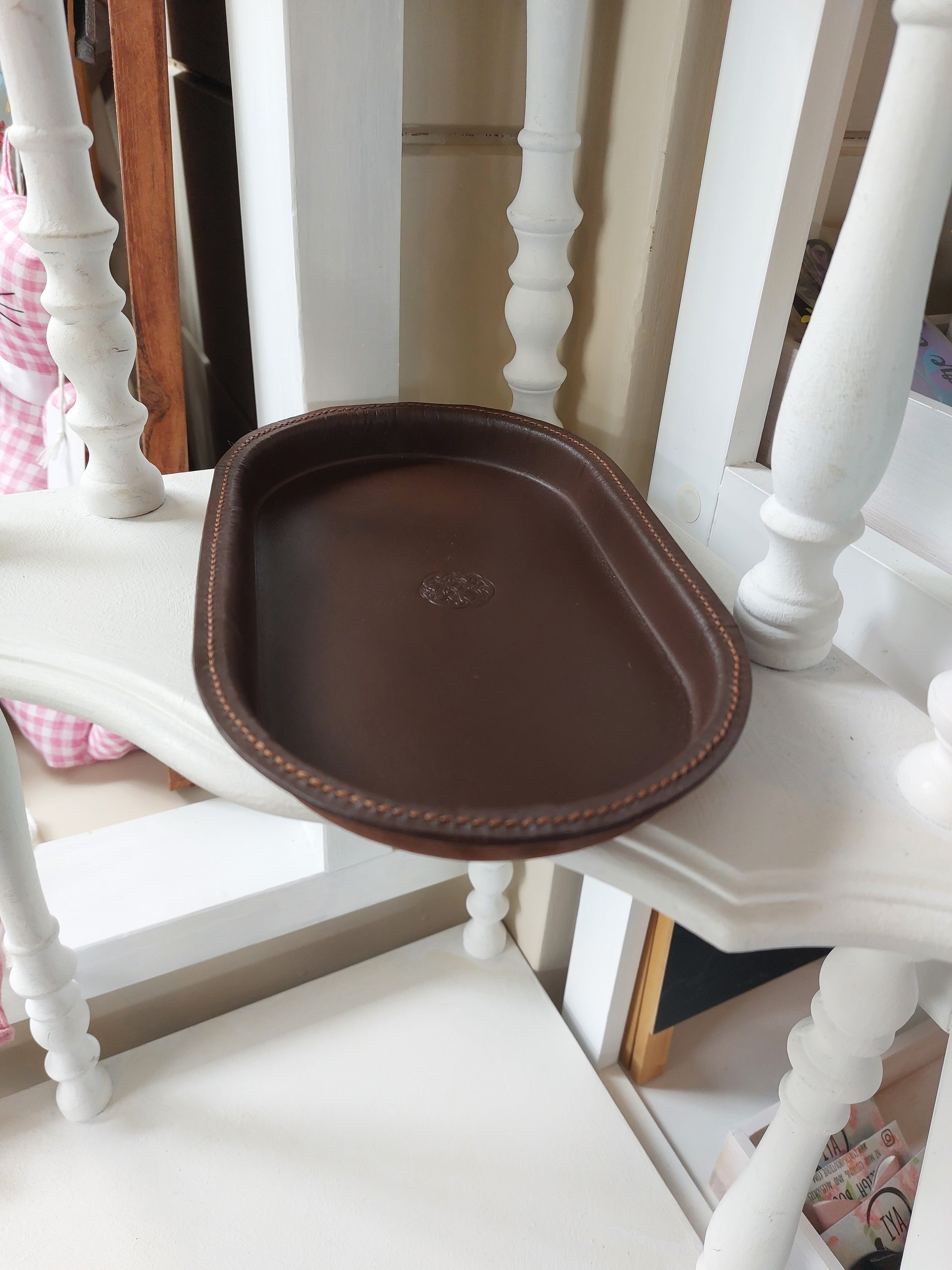 Oval Catch-All Tray handmade with Brown Kangaroo leather, created using the wet-forming technique. Stamped with the Albannach Crafts logo.
