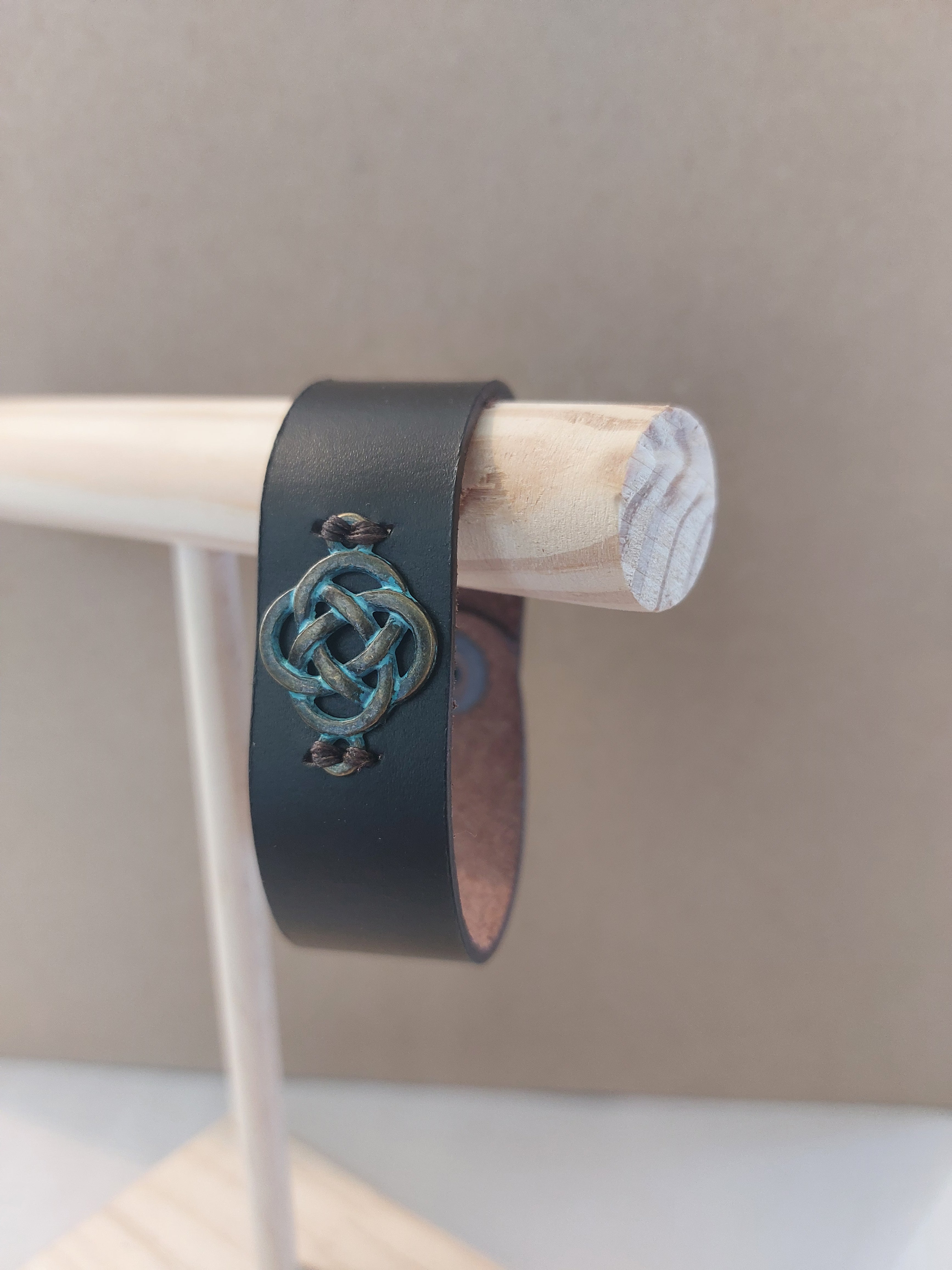 Celtic Knot Wrist Band made with dark brown leather.