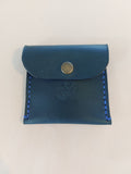 Simple Coin Purse made with navy blue dyed vegetable-tanned leather and finished with a brass closure. Stamped with the Albannach Crafts logo.