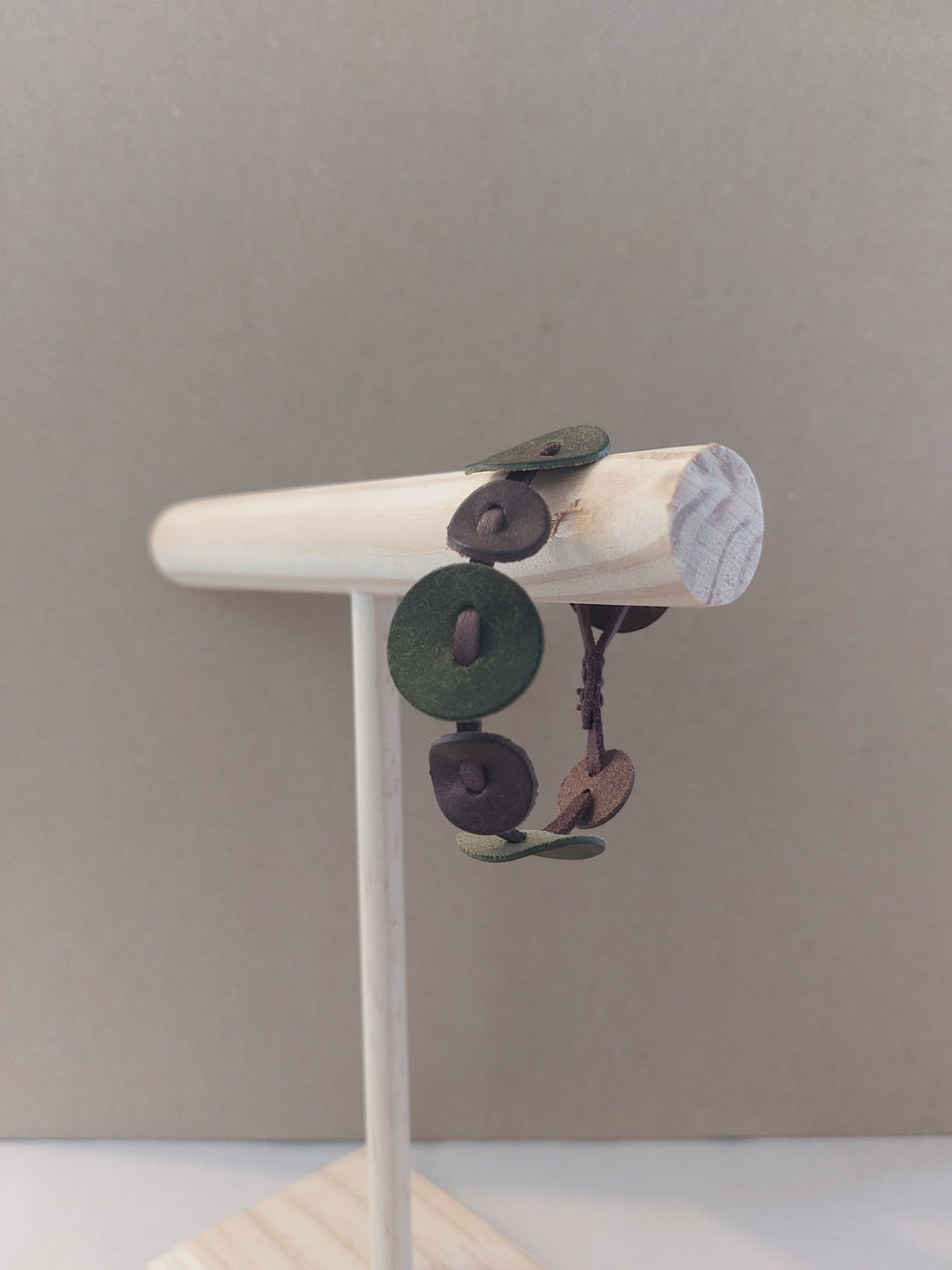 Olive Green Circle Bracelet made with small circles of scrap leather.