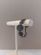 Olive Green Circle Bracelet made with small circles of scrap leather.