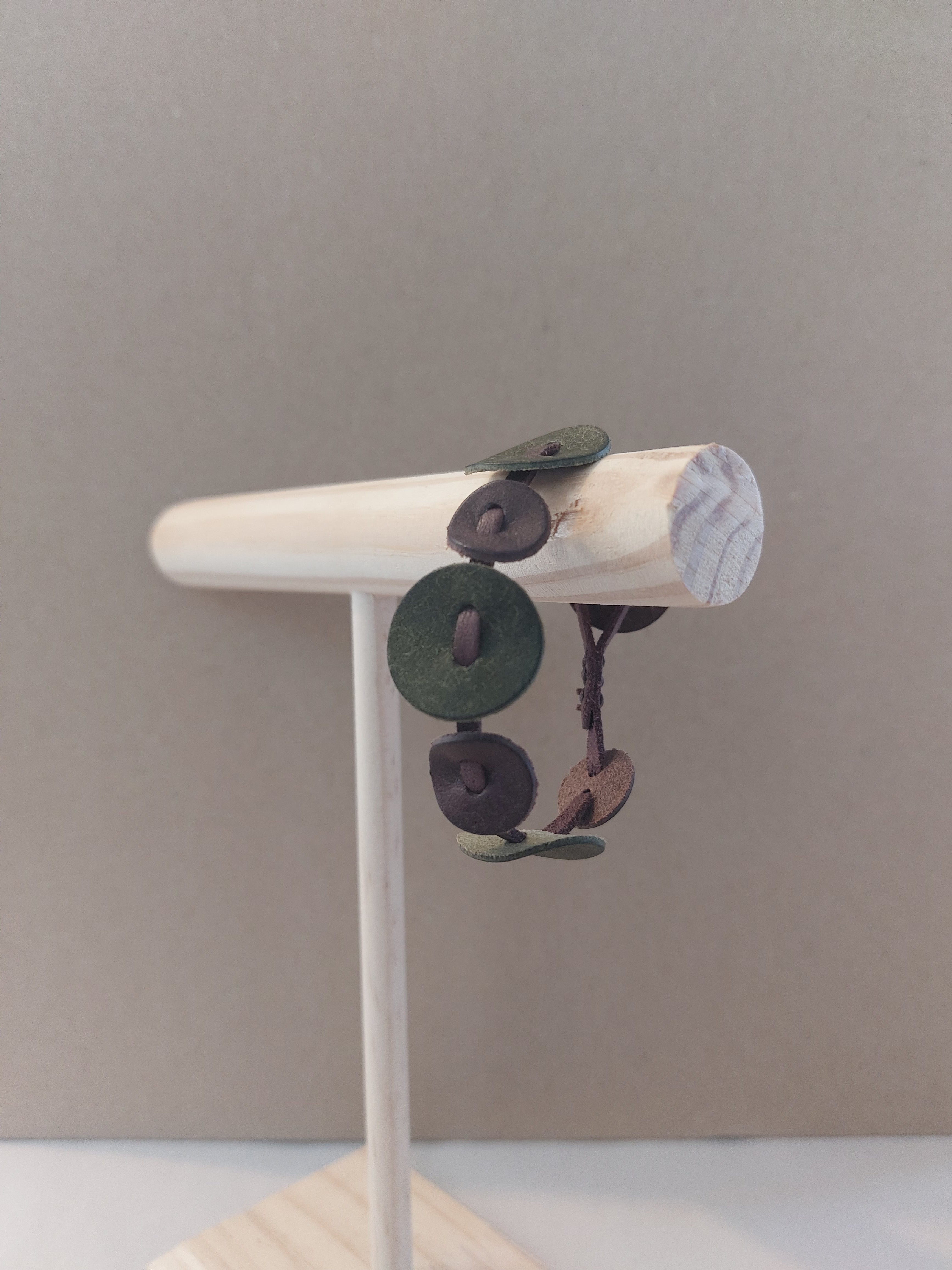 Olive Green Circle Bracelet made with small circles of scrap leather.