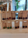 A collection of 9 Circle Earrings made from a variety of different colours of scrap leather. Complete with stainless steel fittings.